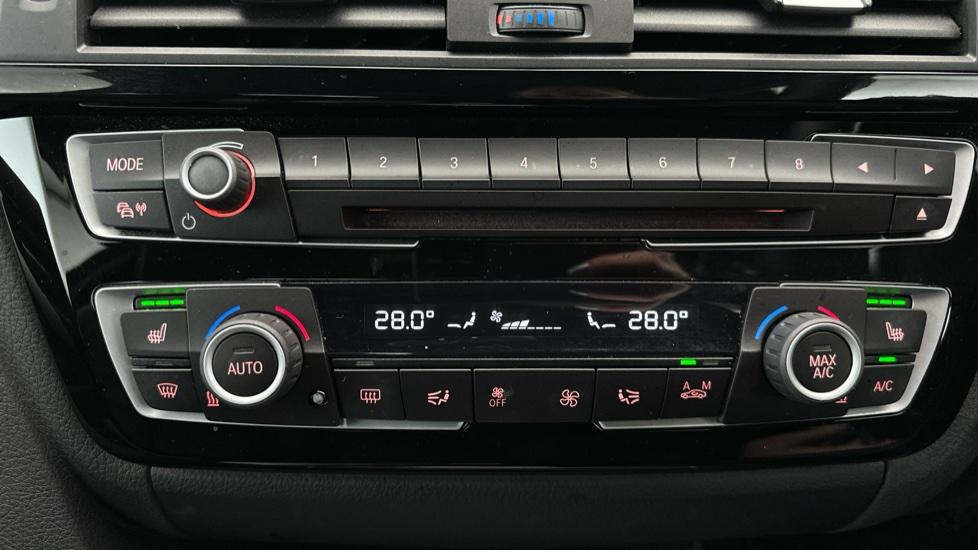 Dual Climate Control  / Air Conditioning  / Heated Seats 