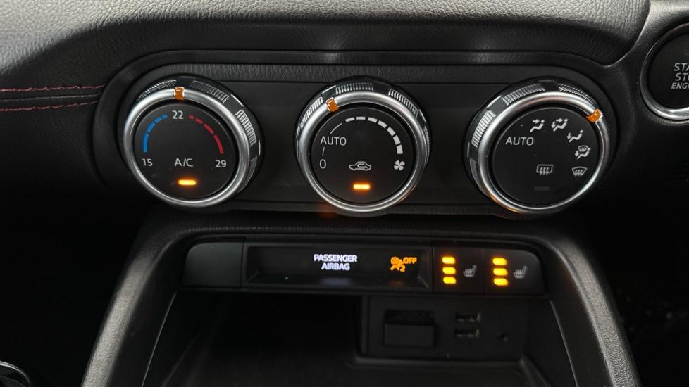 Air Conditioning  / Heated Seats 