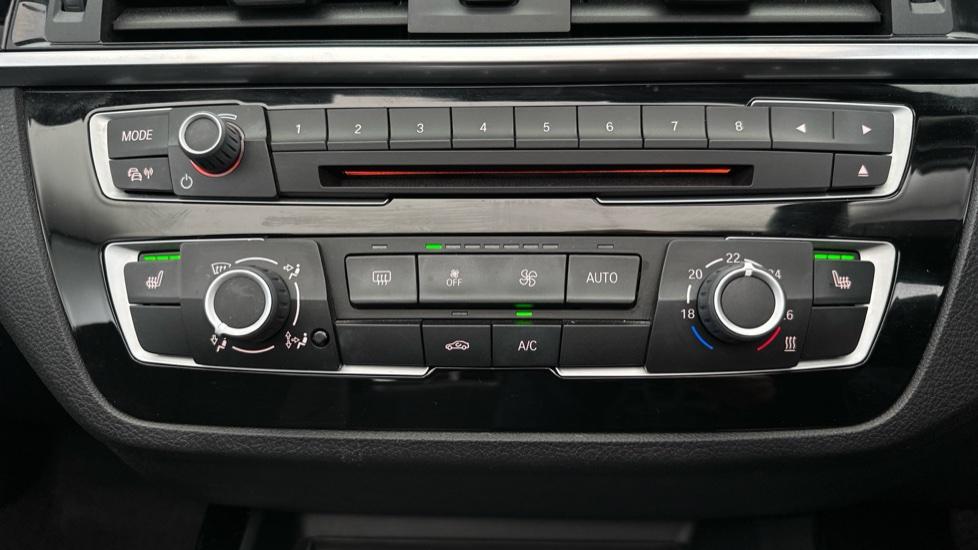 Air Conditioning  / Heated Seats 