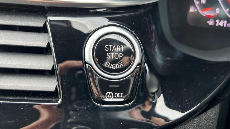 Push button start with auto start stop