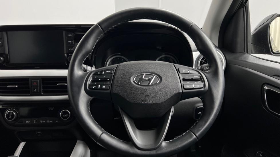 Multifunction steering wheel 