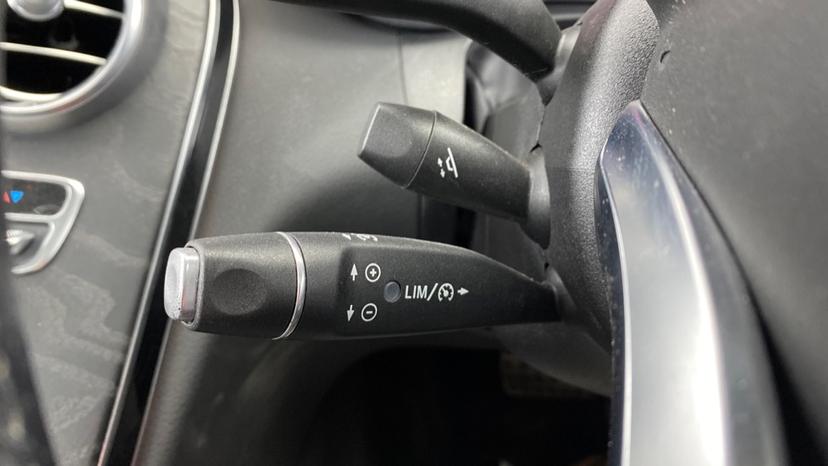Electronic steering wheel adjustment and Cruise control speed limiter