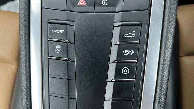 Sport mode, traction control off, spoiler lift and automatic stop start